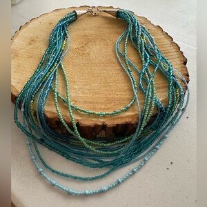 Multi strand seed bead, necklace, in greens and blues